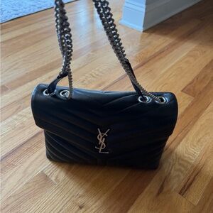 Saint Laurent Purse only worn a few times. Have the original receipt.